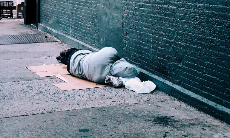 Person sleeping rough on the street