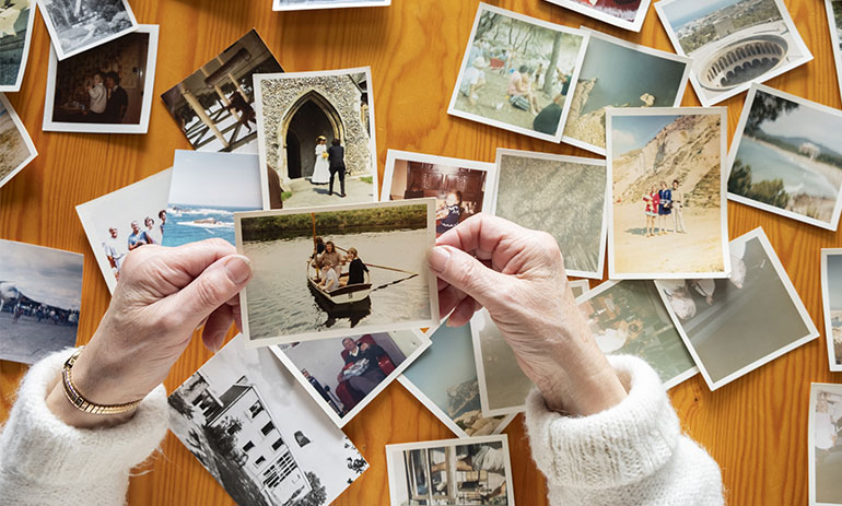 someone looking at old photos