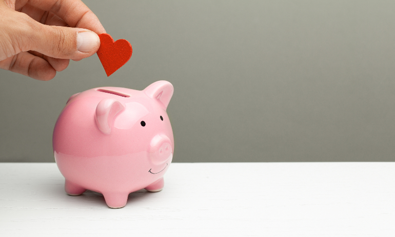 Man puts heart in piggy bank