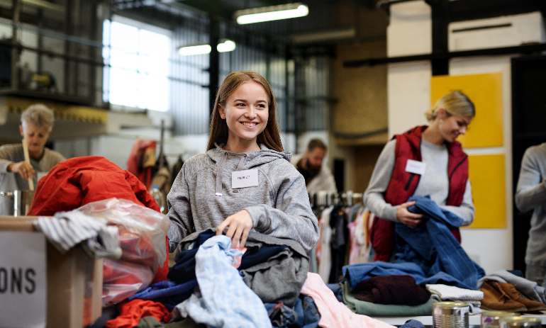 Charity workers sorting through donations