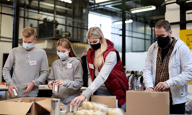 volunteers sort donations