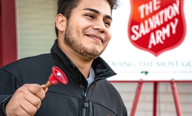 man from Salvaation Army ringing the red bell