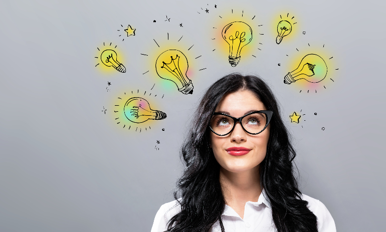 Woman with cartoon lightbulbs over her head