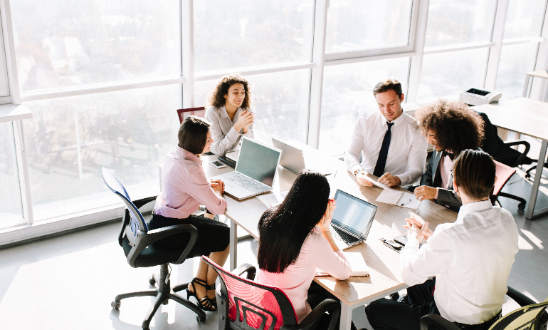 Board members around a table