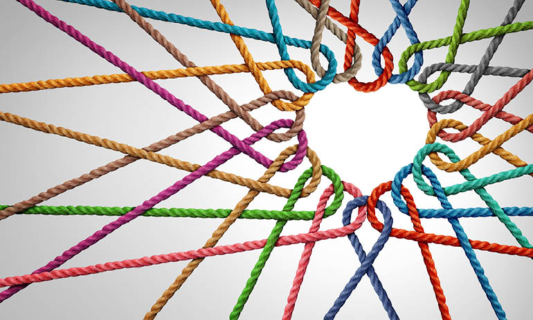 different colours of rope looped together to form a heart shape