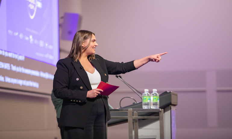 woman speaking at conference