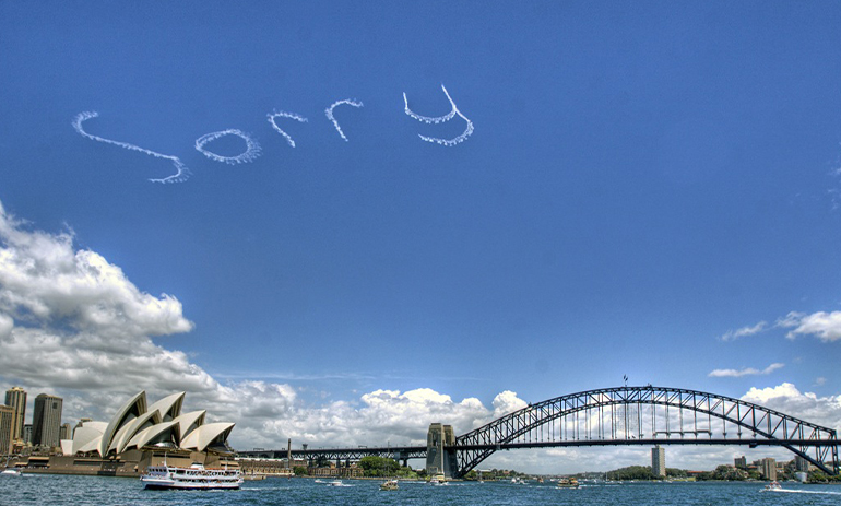 Sky writing over the Sydney Opera House saying sorry